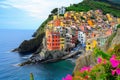 A vibrant village perched on a cliff, offering a breathtaking view of the ocean, A colorful Italian coastal village, AI Generated