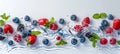 Vibrant water splash with fruits and berries on white background Royalty Free Stock Photo