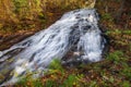 Vibrant waterfall in New England with fall foliage