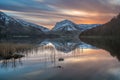 Vibrant Winter Sunrise With Snow On Buttermere Fells In The Lake District. Royalty Free Stock Photo