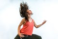 Vibrant woman enjoys gym session