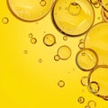 Vibrant yellow background with floating transparent bubbles Royalty Free Stock Photo