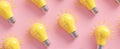 The vibrant yellow lightbulbs illuminating creativity on a pink background..AI generated image Royalty Free Stock Photo