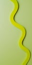 Vibrant yellow lines undulating against a calming green backdrop create a visually striking contrast, evoking a sense of Royalty Free Stock Photo