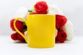 Vibrant Yellow Mug Againts Rose Flower Bouquet Royalty Free Stock Photo