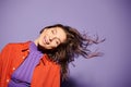 Vibrant young woman in orange attire Royalty Free Stock Photo