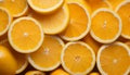Vibrant and zesty citrus fruit slices arranged beautifully on a background of juicy oranges