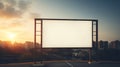 Vibrant sunset forming a fiery backdrop for a blank billboard frame, perfect for bold advertising