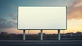 Vibrant sunset forming a fiery backdrop for a blank billboard frame, perfect for bold advertising