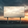 Vibrant sunset forming a fiery backdrop for a blank billboard frame, perfect for bold advertising