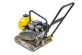 Vibrating rammer on a white isolated background. Vibratory plate compactor designed for the compaction of granular, mixed Royalty Free Stock Photo