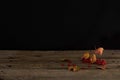 Viburnum berries and yellowed leaves on the surface of old wood boards. Royalty Free Stock Photo