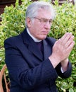 Vicar praying