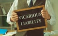Vicarious liability sign in the hands of financial advisor. Royalty Free Stock Photo
