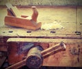 vice and plate on work bench with antique effect Royalty Free Stock Photo