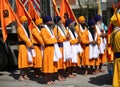 Vicenza, VI, Italy - April 8, 2017: Men with turbans Sikh Religious procession with ceremonial scimitars Royalty Free Stock Photo
