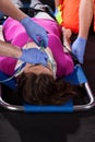 Victim of accident lying on stretcher Royalty Free Stock Photo