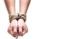 Victim, slave, prosoner male hands tied by big rope