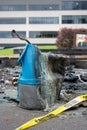 Melted blue plastic from a portable toilet fire