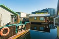 VICTORIA BC CANADA FEB 12, 2019: Victoria Inner Harbour, Fisherman Wharf is a hidden treasure area. With colorful floating homes, Royalty Free Stock Photo