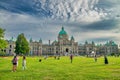 Victoria, Canada - August 14, 2017: Historic parliament building in the city center of Victoria with colorful flowers on a sunny Royalty Free Stock Photo