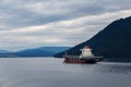 Victoria, Canada - Circa 2017: Cargo ship traversing British Col