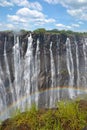 Victoria Falls with rainbow on Zambezi River, view from Zimbabwe, Africa Royalty Free Stock Photo