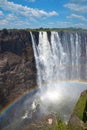 Victoria Falls with rainbow on Zambezi River, view from Zimbabwe, Africa Royalty Free Stock Photo