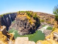 Victoria Falls on Zambezi River. Dry season. Border between Zimbabwe and Zambia, Africa. Fisheye shot Royalty Free Stock Photo