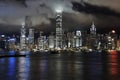 Victoria Harbour, Hong Kong, at night with low clouds Royalty Free Stock Photo