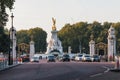 Victoria Memorial in London. Busy day with people and cars on the street. Editorial