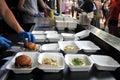 Fast food preparation of hamburgers in an outdoor market in London England Royalty Free Stock Photo