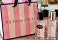 Victoria`s Secret perfum bottles and shopping bag Royalty Free Stock Photo