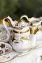 Victorian antique porcelain coffee service in gold and white Royalty Free Stock Photo