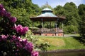 Victorian bandstand with flowers in springtime at Sefton park in Liverpool