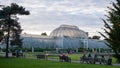 Victorian era Palm House at Kew Gardens, London UK, photographed in the late afternoon with the sun setting. Royalty Free Stock Photo