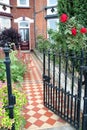 Victorian gated cottage garden Royalty Free Stock Photo