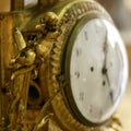 Antique carved wooden clock angel detail Royalty Free Stock Photo