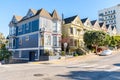 Victorian houses along a sloping street in San Francisco Royalty Free Stock Photo