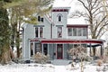 Snow Covered Victorian Italianate House