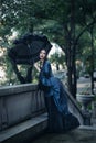 Victorian lady in blue Royalty Free Stock Photo