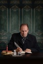 Victorian office worker writing in his ledger Royalty Free Stock Photo