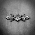 Victorian ornamental work of metal on antique steel gate. black and white image