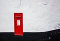 A Victorian post box embedded in a common wall Royalty Free Stock Photo