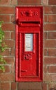 Victorian post box mounted in red brick column Royalty Free Stock Photo