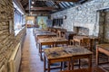 Victorian schoolroom with wooden desks and ink wells in Scaplen`s Court, Poole, Dorset