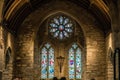 Stained glass church window depicting Saints