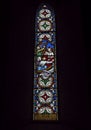 A Victorian Stained Glass Window depicting Christ in a Boat, within the Church of St Michael and All Angels next to Ford Castle Royalty Free Stock Photo