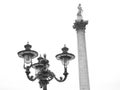 A Victorian street lamp and Nelson's Column in Trafalgar Square, L