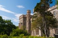 Victorian style architecture and design. Lews Castle in garden of Stornoway, United Kingdom. Castle with green trees on Royalty Free Stock Photo